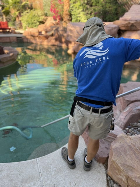 Weekly Pool Maintenance Service in Henderson NV Pool technician performing weekly pool maintenance in Henderson Nevada